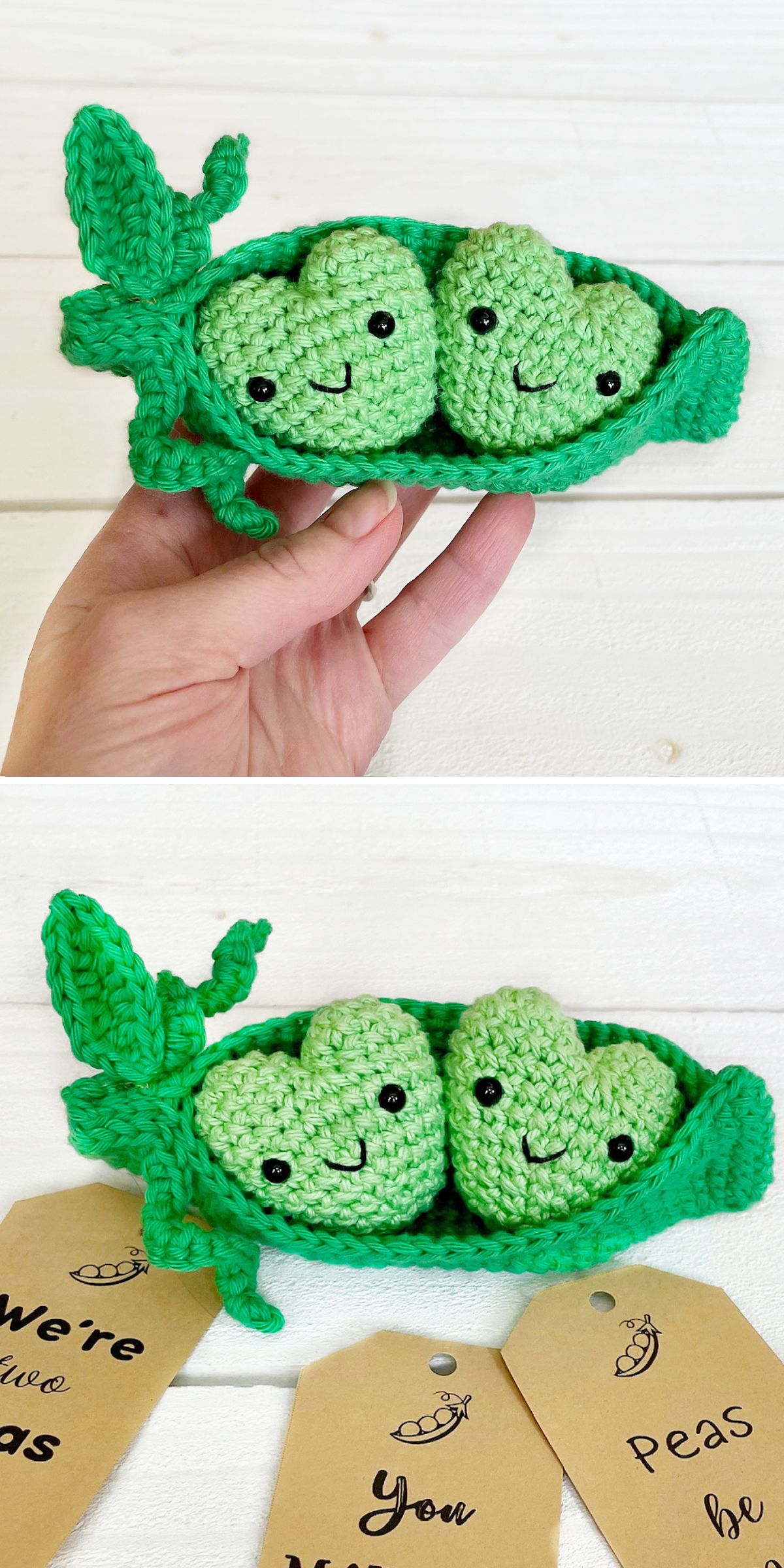 Two crocheted green peas with smiling faces sit in a crocheted pea pod, held in a hand, showcasing charming garden crochet. Gift tags nearby read "We're two peas" and "You be," perfect for anyone who loves creative crochet vegetable patterns.