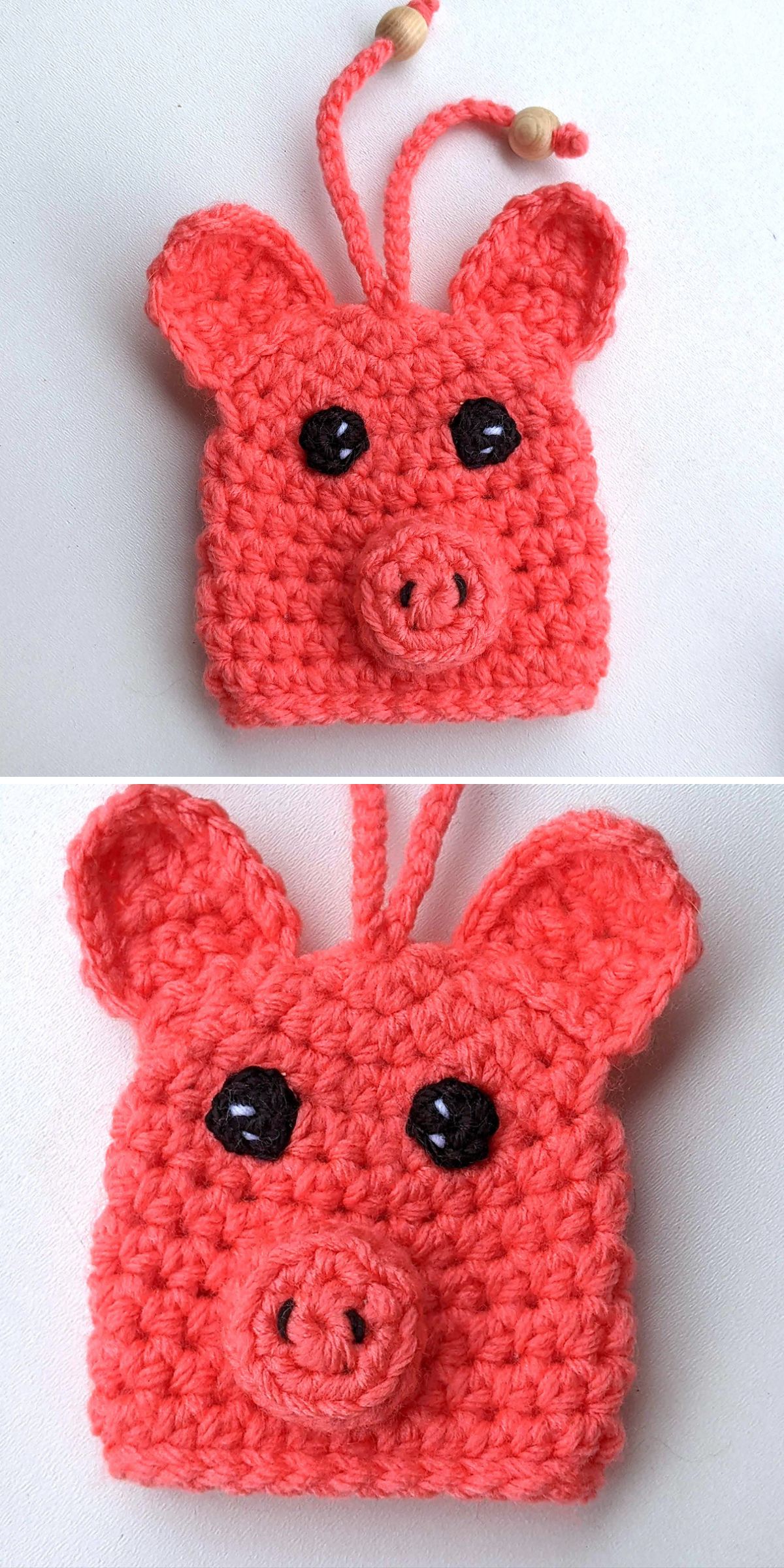 Two images show a small, crocheted pink pig face with black eyes, large ears, a snout, and two drawstring cords with wooden beads at the top—perfect as a playful crochet cozy for your favorite items.