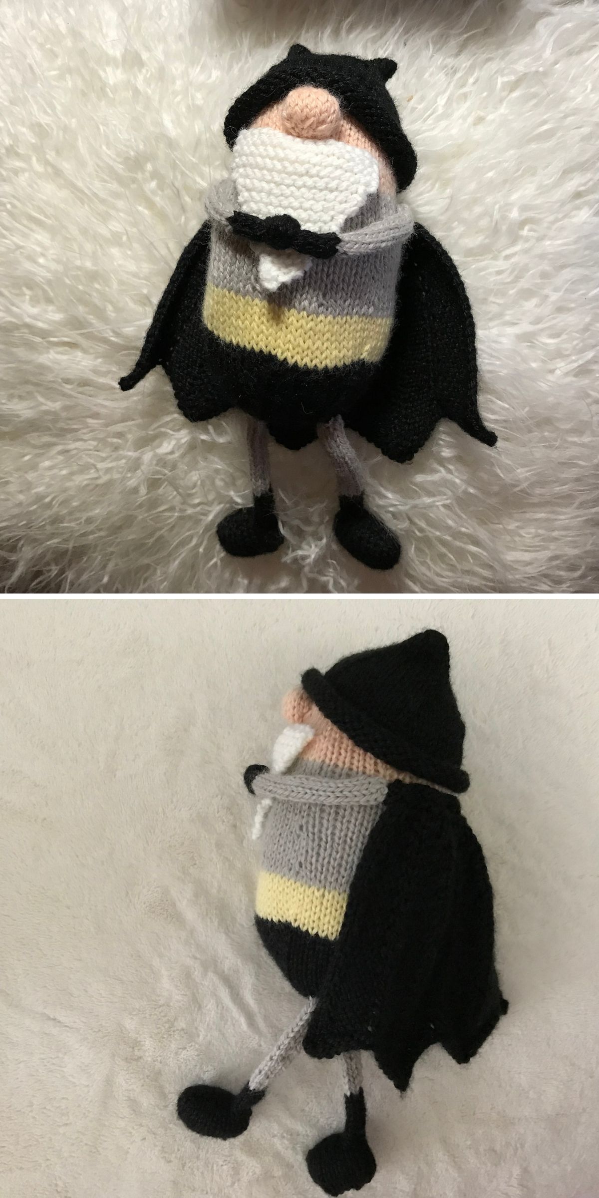 Knit toy gnome with black hat, cape, and yellow-striped outfit, featuring a white beard and nose, shown from front and side angles on a fuzzy white surface.