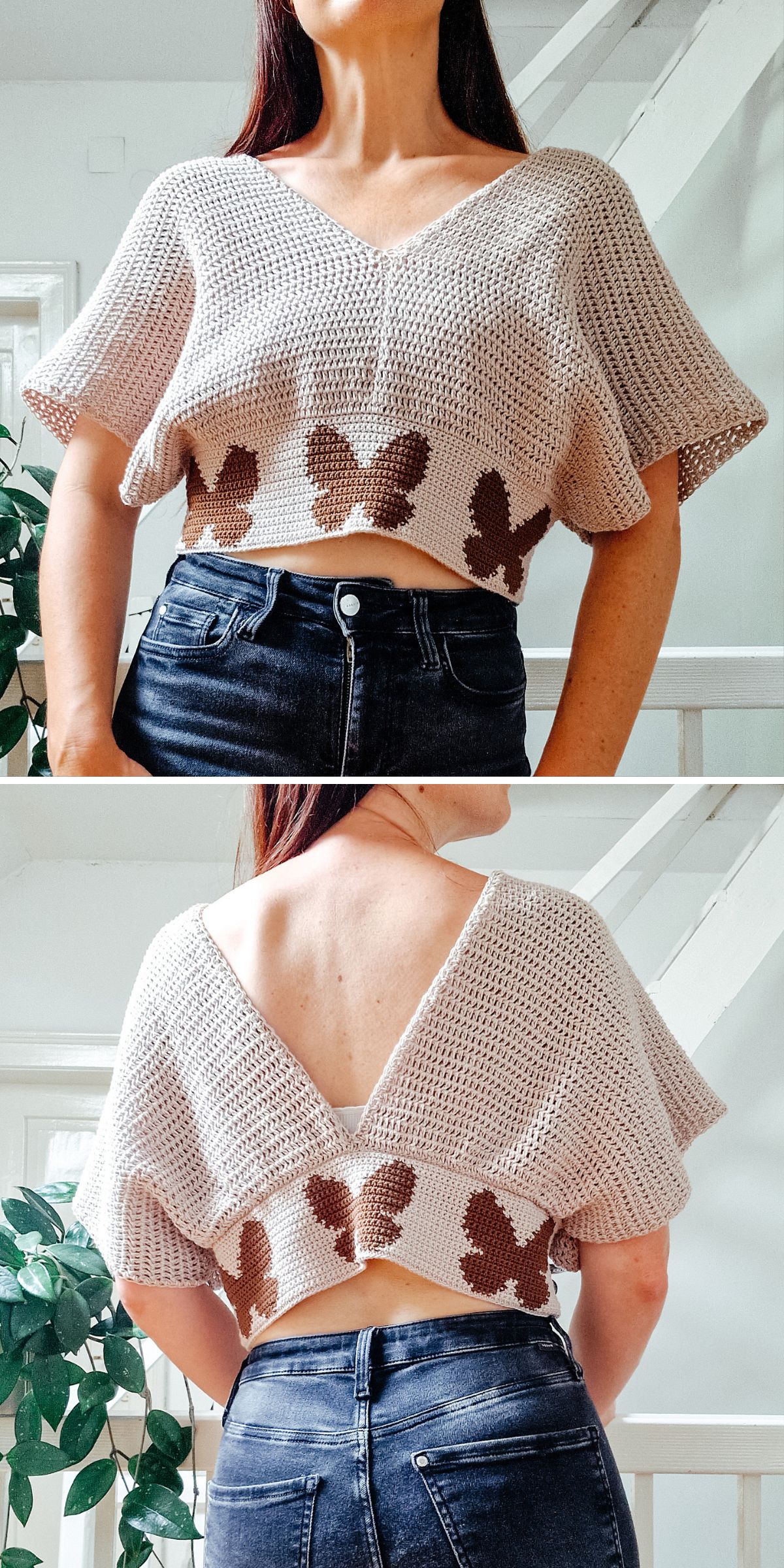 A person wearing a crochet beige crop top with brown butterfly designs, styled like a crochet tee, paired with high-waisted jeans. The top features a V-neckline in the front and back.