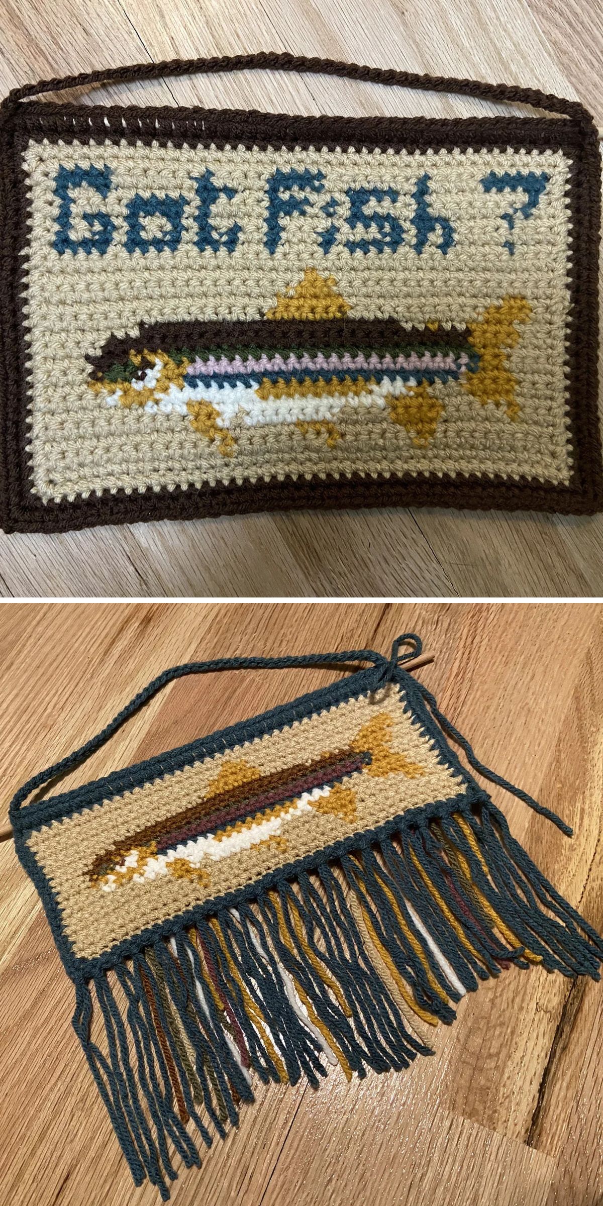 Two handmade needlepoint signs: the first says "Got Fish?" with a fish image, and the second features a fish with long fringe hanging from the bottom, reminiscent of a crochet wall hanging. Both are displayed on a wooden floor.