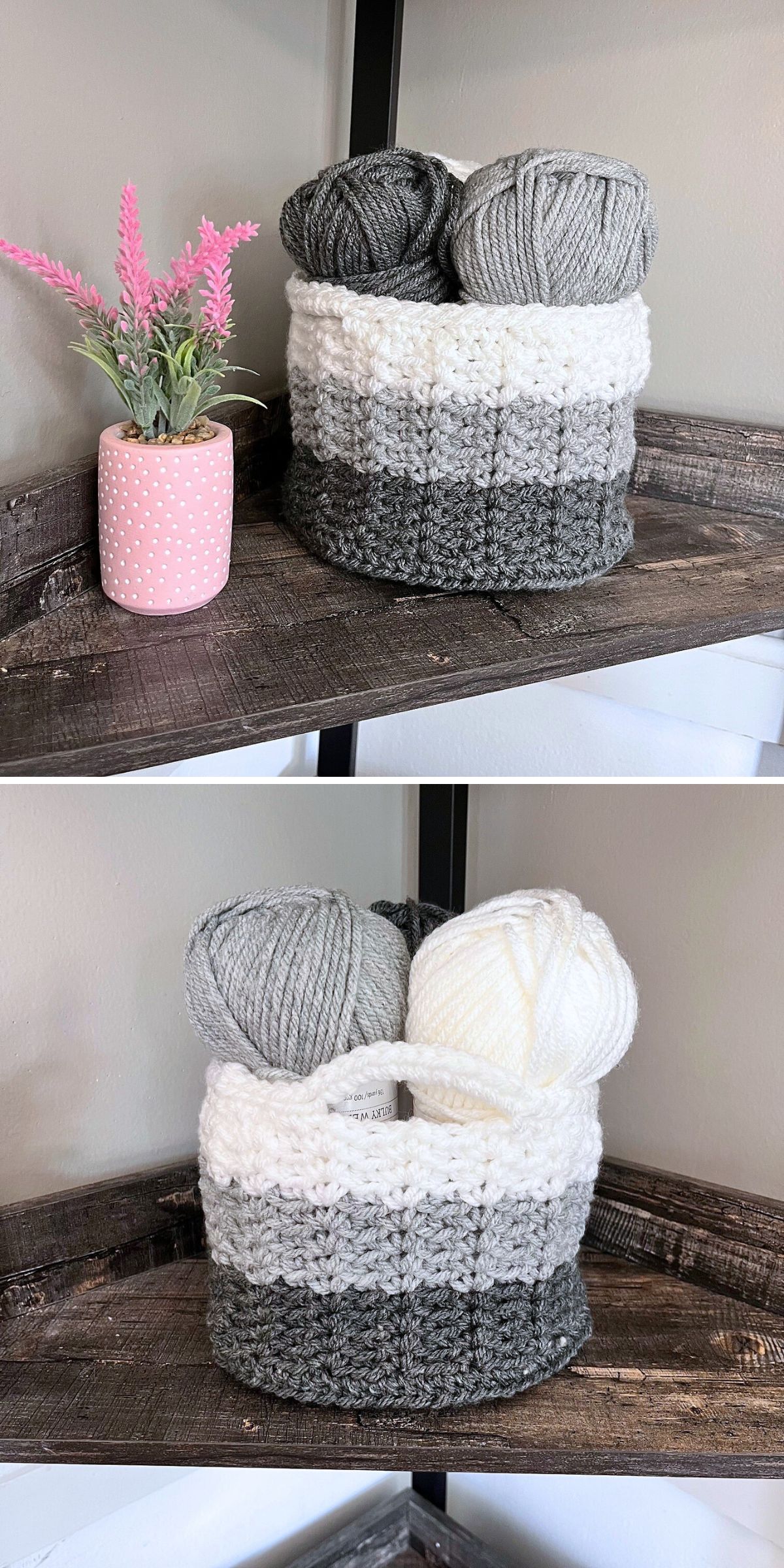 A gray and white crochet basket holding two skeins of yarn sits on a wooden shelf next to a pink pot with artificial pink flowers.