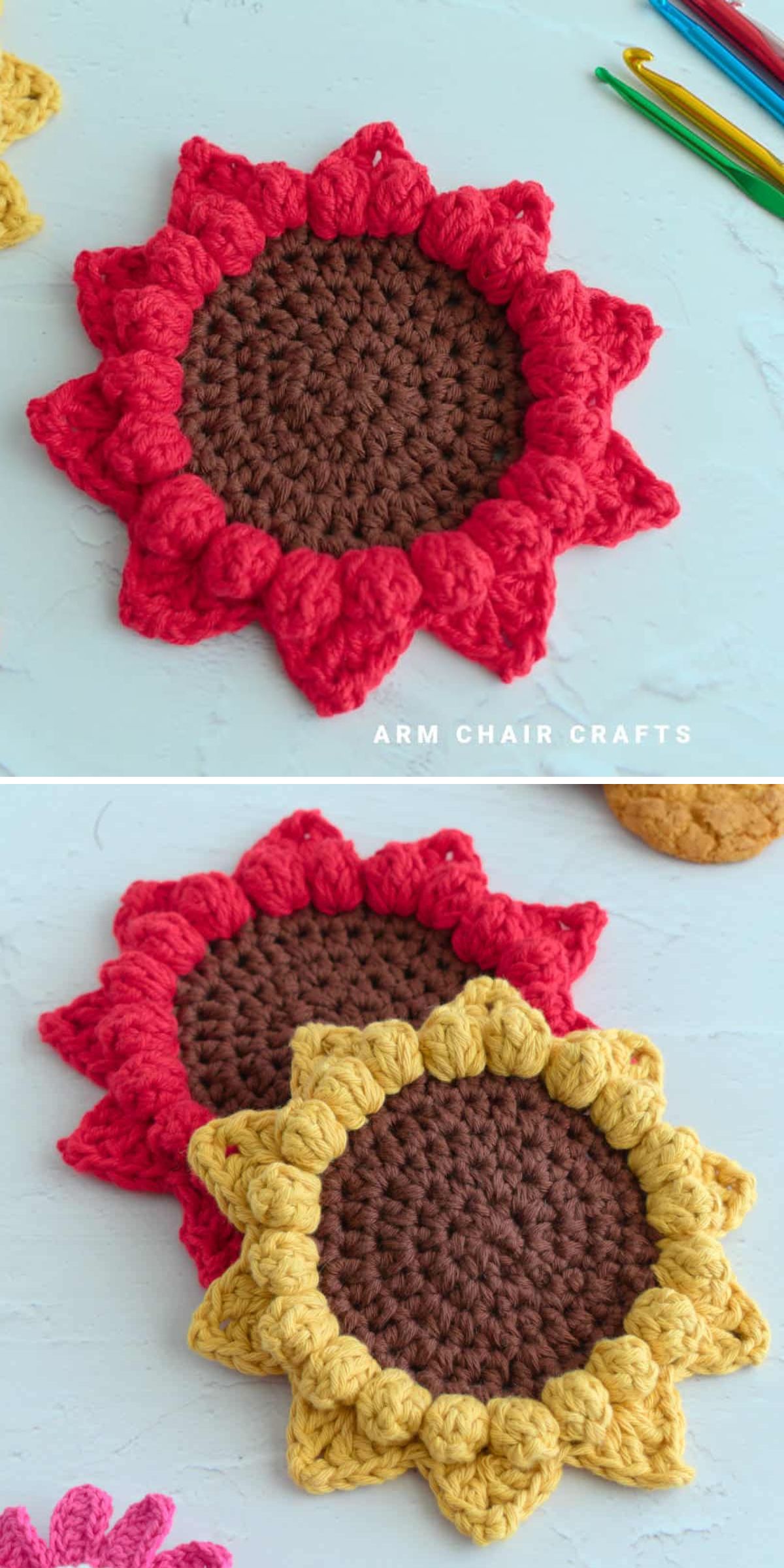 Two crochet sunflower coasters, one with vibrant red petals and the other with classic yellow, each featuring a brown center, are displayed on a light surface with crochet hooks in the background.
