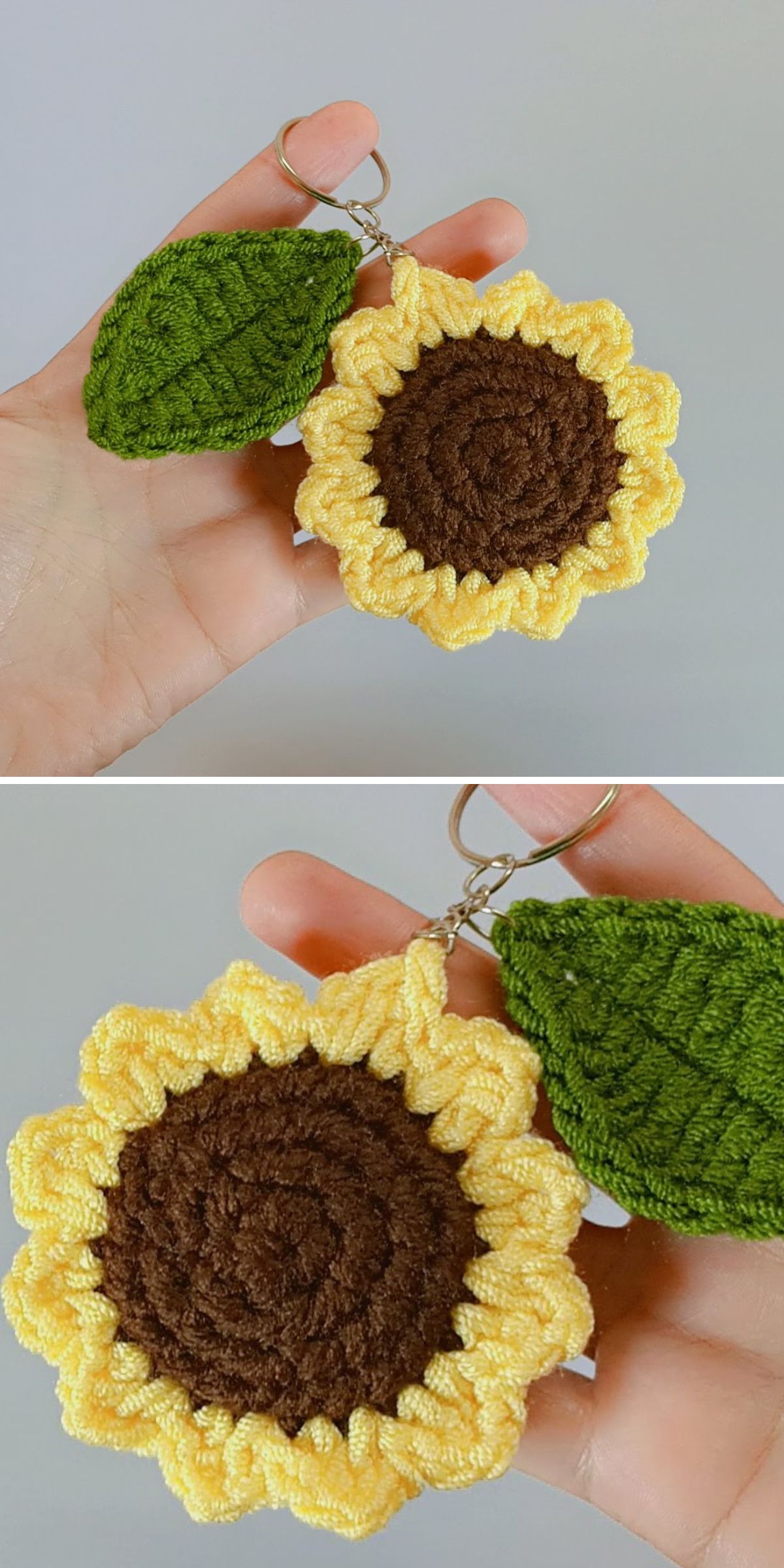 A hand holds a keychain with a crochet sunflower featuring yellow petals, a brown center, and a textured green leaf attached.