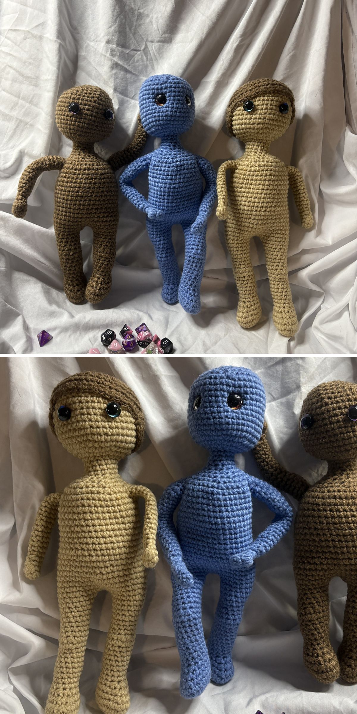 Three crochet humanoid dolls — two brown and one blue — are posed standing together in front of a white fabric backdrop, with various dice scattered near their feet. They are a perfect base for creating customizable crochet dolls amigurumi
