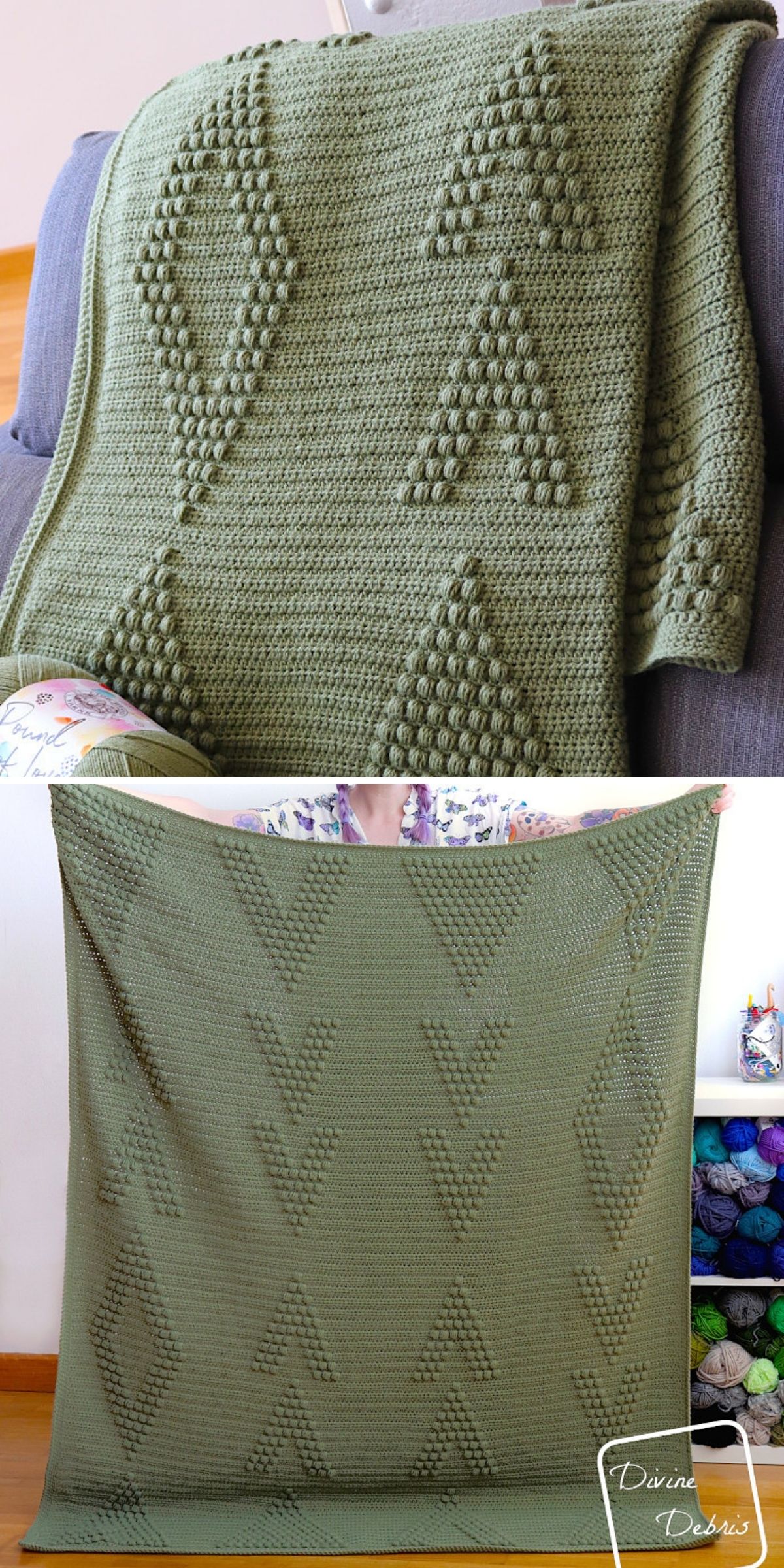 A green crochet bobble stitch blanket with raised diamond and triangle patterns is draped over a surface and held up for display.