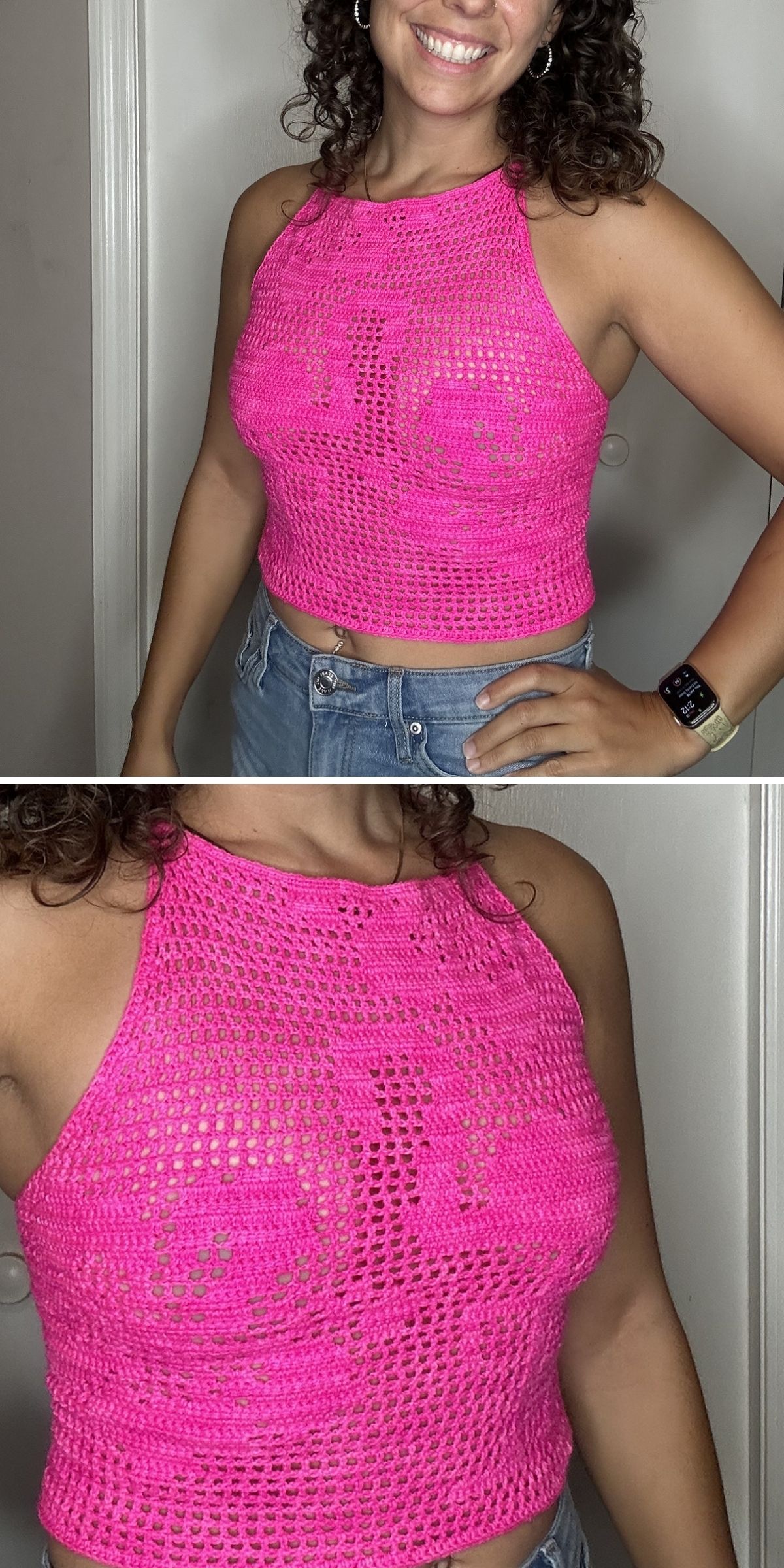 Woman wearing a bright pink, crochet tank top and blue jeans, standing indoors and smiling.