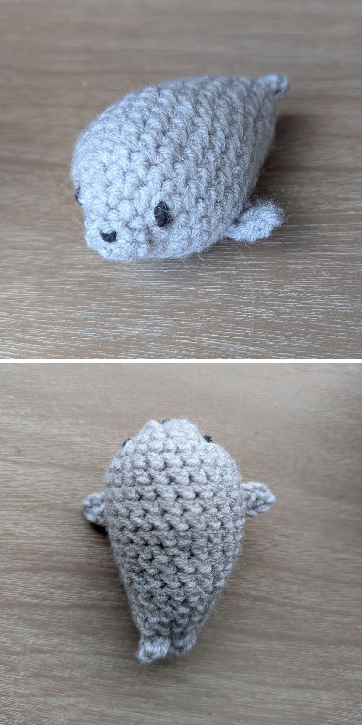 A small, gray, crochet animal plush toy in the shape of a seal is shown from a side view and a top view on a wooden surface.