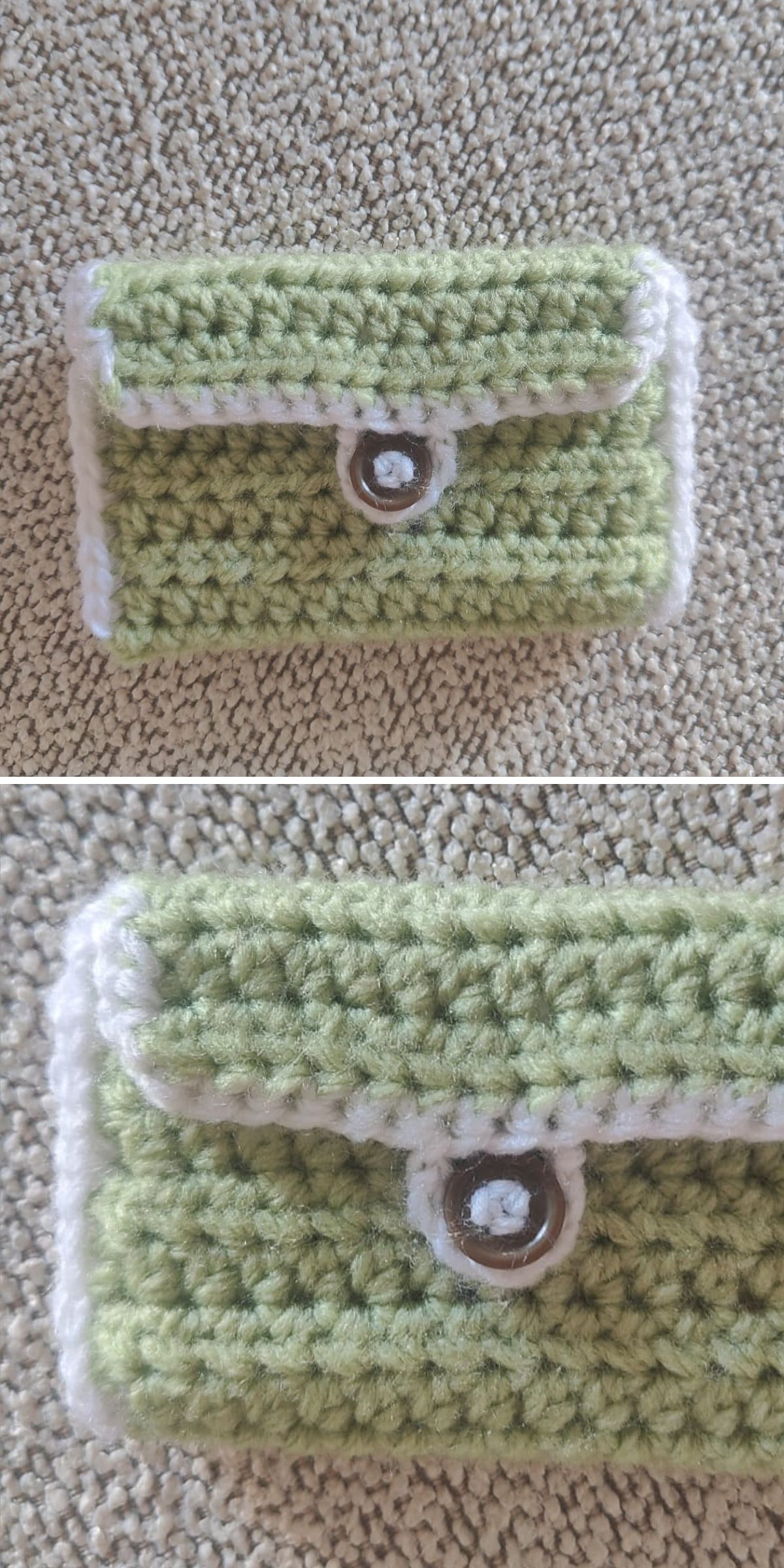 A small, green crocheted pouch with a white border, featuring a flap and a button closure, placed on a textured beige surface—perfect as a charming crochet wallet for your essentials.