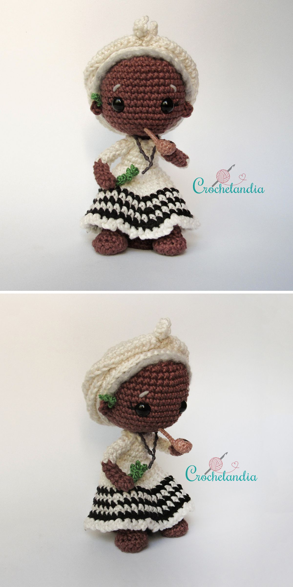 A crocheted doll with brown skin, wearing a white headscarf, a black and white dress, and green earrings, displayed on a plain background — an adorable example for those seeking crochet doll patterns or fans of unique crochet characters.