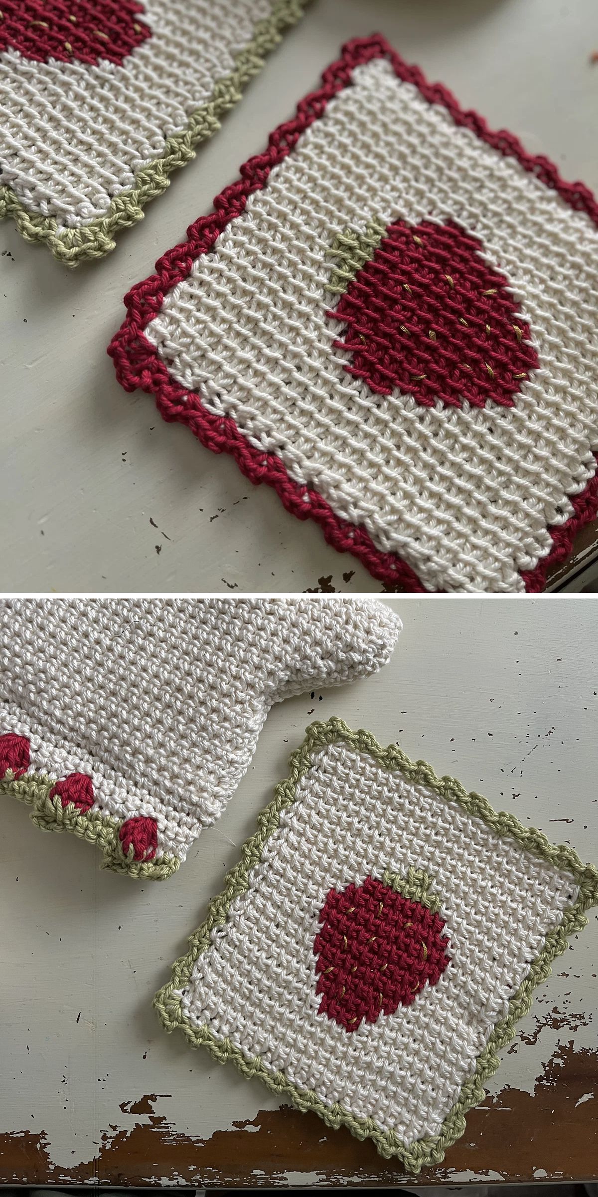 Two crochet squares with strawberry designs and colored borders, alongside a white crocheted item with small red and green details, are displayed on a light surface — a charming set that would perfectly complement any kitchen or tabletop as unique crochet hot pads.