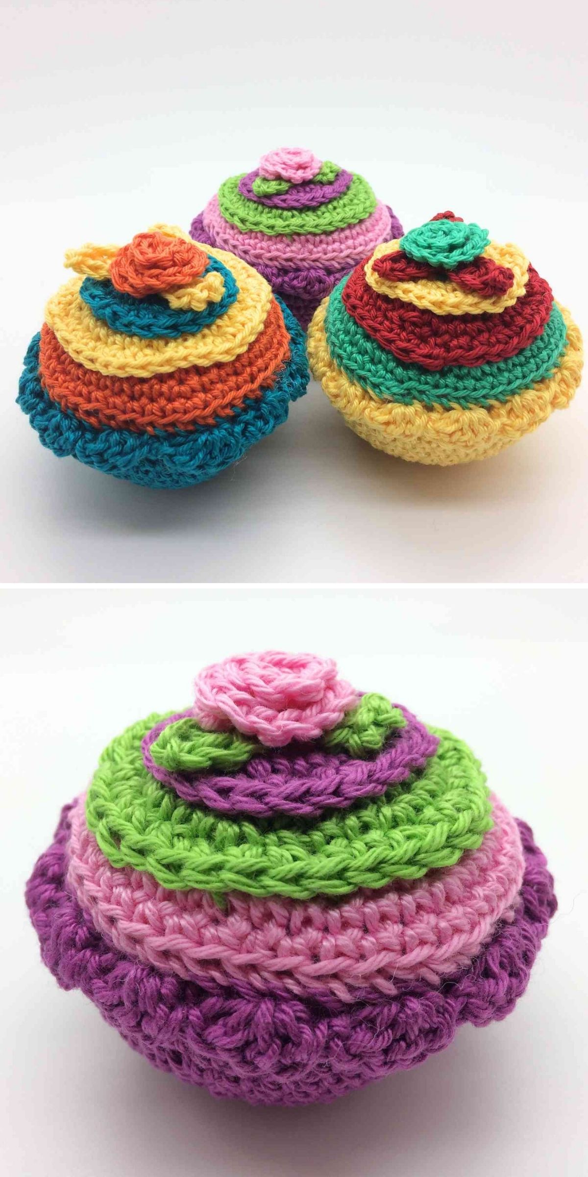 Three colorful, round crocheted objects with layered, concentric rings and a small flower motif on top, reminiscent of a charming crochet dessert, displayed on a white background.