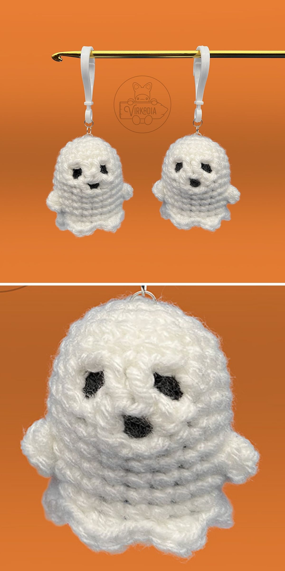 Two small, white crocheted ghost ornaments with black stitched eyes and mouths hang from white ribbons against an orange background—perfect inspiration if you’re searching for free crochet ghost patterns for Halloween.