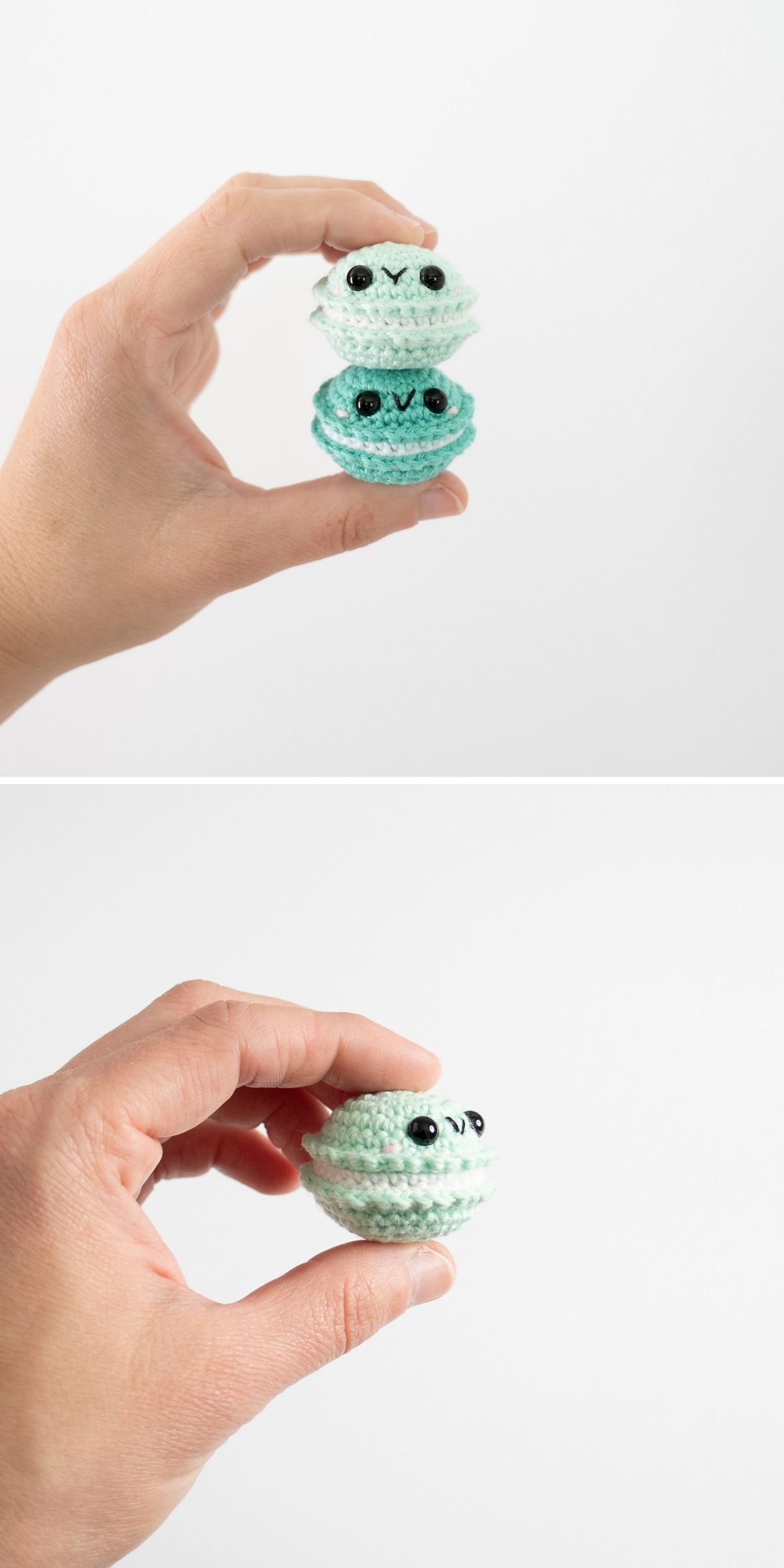 A hand holds and opens a small, crocheted mint green macaron with black eyes and a face, revealing the inside of this adorable crochet dessert.