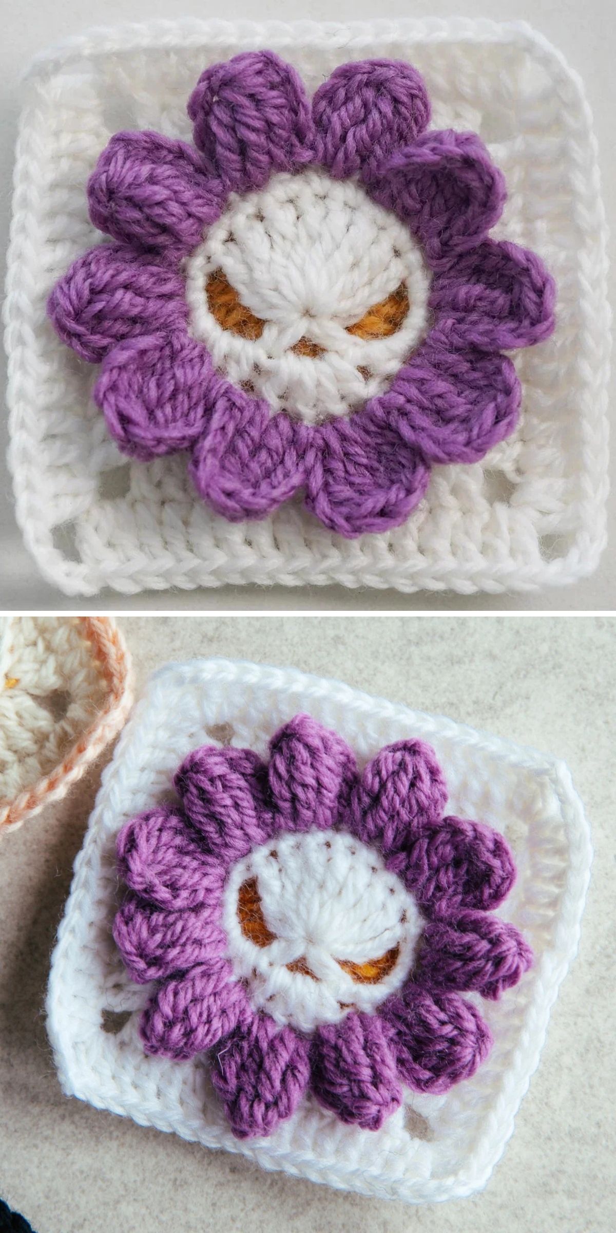 A crochet halloween square featuring a purple flower design with a white center and yellow details, laid on a light surface.