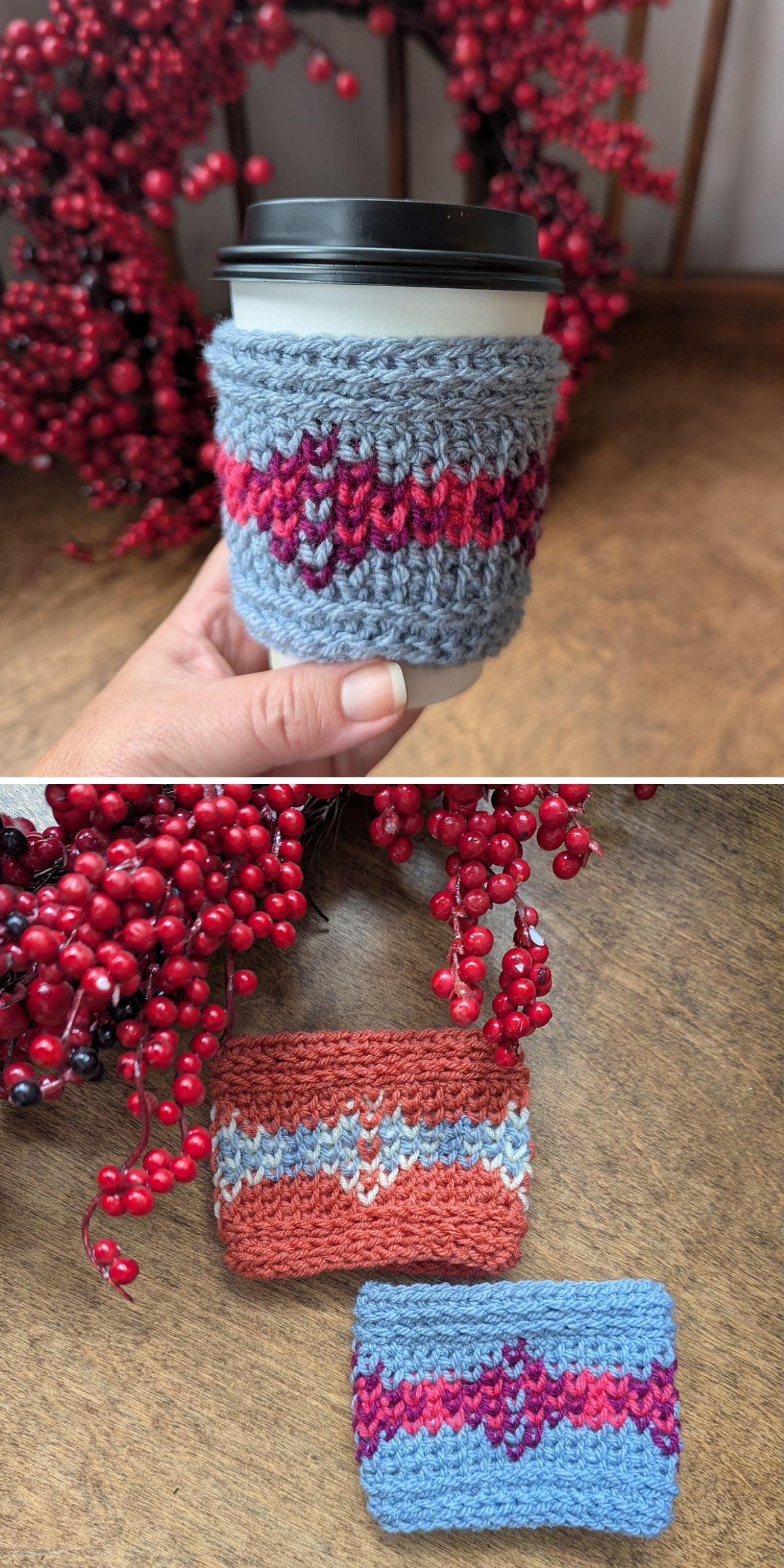 Two crochet cup sleeves with red, blue, and pink patterns — reminiscent of a crochet mug cozy — one wrapped around a coffee cup, displayed on a wooden surface with red berries in the background.