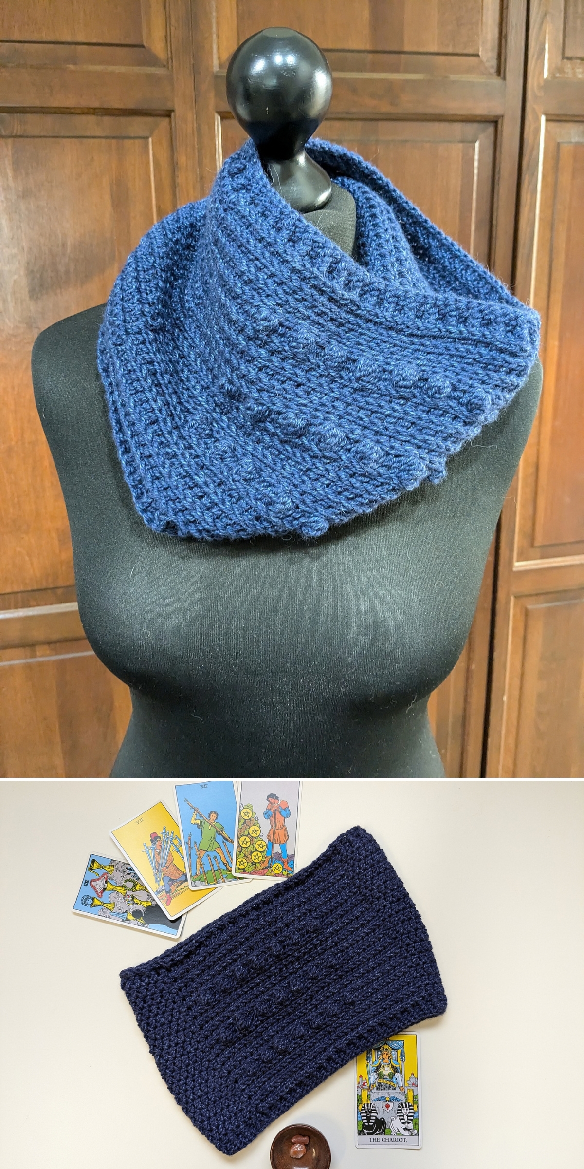A blue crochet cowl pattern on a mannequin, with a second view of the folded cowl resting on a table beside four tarot cards.