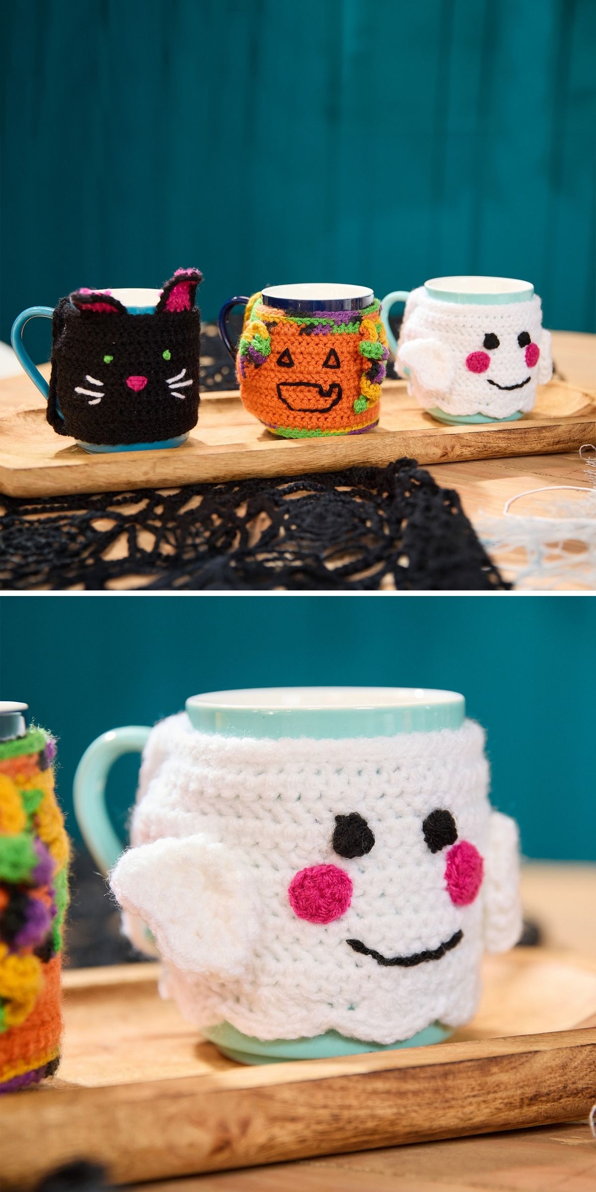 Three mugs on a wooden tray, each wearing a crochet mug cozy shaped like a black cat, a pumpkin, and a white ghost.