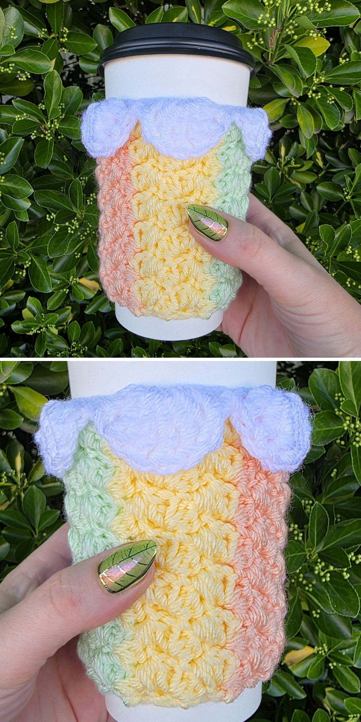 A hand holds a coffee cup featuring a pastel-colored crochet mug cozy with a scalloped edge against a leafy green background.